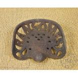 A Bransoms of Ipswitch vintage cast iron tractor seat, 38.