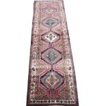 A Caucasian wool runner, worked with an abrashed field,