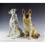Two Beswick Fireside Model Series dogs designed by Graham Tongue, comprising; Alsatian 2410, 35.