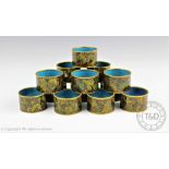 A near set of ten Japanese cloisonne enamel napkin rings, decorated with flowers,