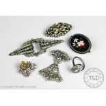 A collection of paste set jewellery, to include; a cornucopia floral brooch in bi-colour metal,