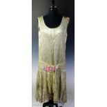 A 1920's French pale green silk flapper dress by Boue Soeurs,
