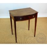 An Edwardian mahogany bow front side table, with drawer, on tapered legs, 75cm H x 62cm W x 47cm D,