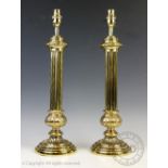 A pair of brass fluted Corinthian column table lamps,