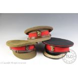 Two military officers metal hat boxes to Brigadier E. E. J.