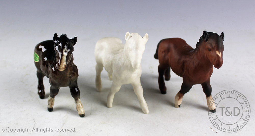 Four Beswick Shetland foals, model number 1034, designed by Arthur Gredington, white matte,