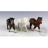 Four Beswick Shetland foals, model number 1034, designed by Arthur Gredington, white matte,