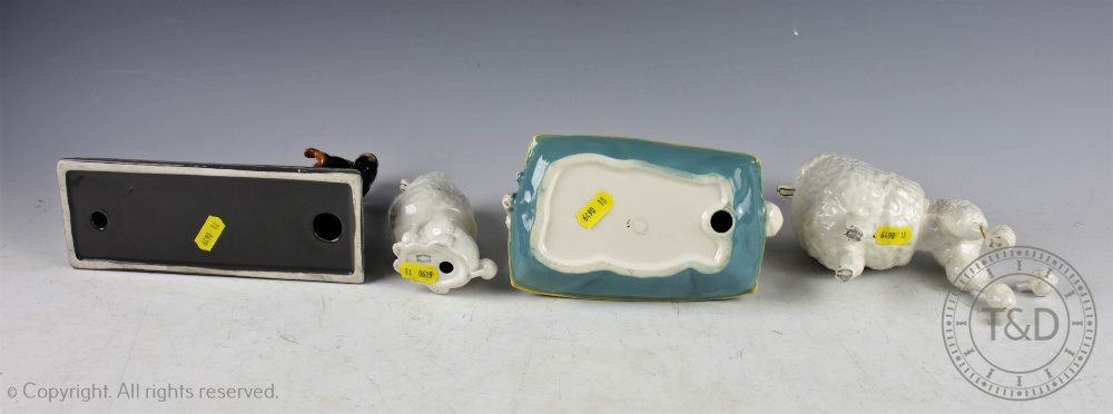 A collection of Beswick dogs, comprising: Poodle on Cushion, model number 2985 in gloss, - Bild 3 aus 3