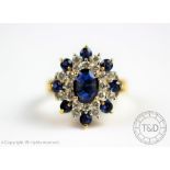 A sapphire and diamond cluster ring in 'snowflake' form,