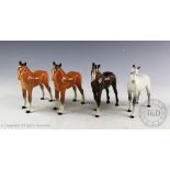 Four Beswick foal (larger thoroughbred type), model number 1813, designed by Arthur Gredington,