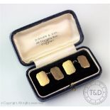 A pair of 9ct yellow gold cufflinks, Birmingham 1920, of canted rectangular form,