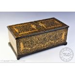 A late Victorian pen work box, the hinged lid enclosing a compartmented interior,