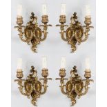 QUATTRO APPLIQUES a due luci in bronzo dorato. Sicilia primi '900 Misure: cm 19 x 10 x h 19