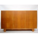 A handmade, mid century cherrywood sideboard unit with shelves, with key. 178 x 57 x 108cm high.