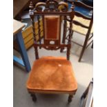 A Victorian rosewood low side chair.