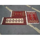 Three Pakistan style small runners, different sizes: 72 x 46.5cm, 71 x 41cm, 104 x 39.5cm (3).