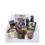 A collection of John Wayne memorabilia comprising a figure of John Wayne made by Effanbee (46cm