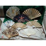 A selection of vintage fans to include two advertising examples from Le Pre-Catelan-Armenonville-