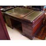 A large twin pedestal desk.