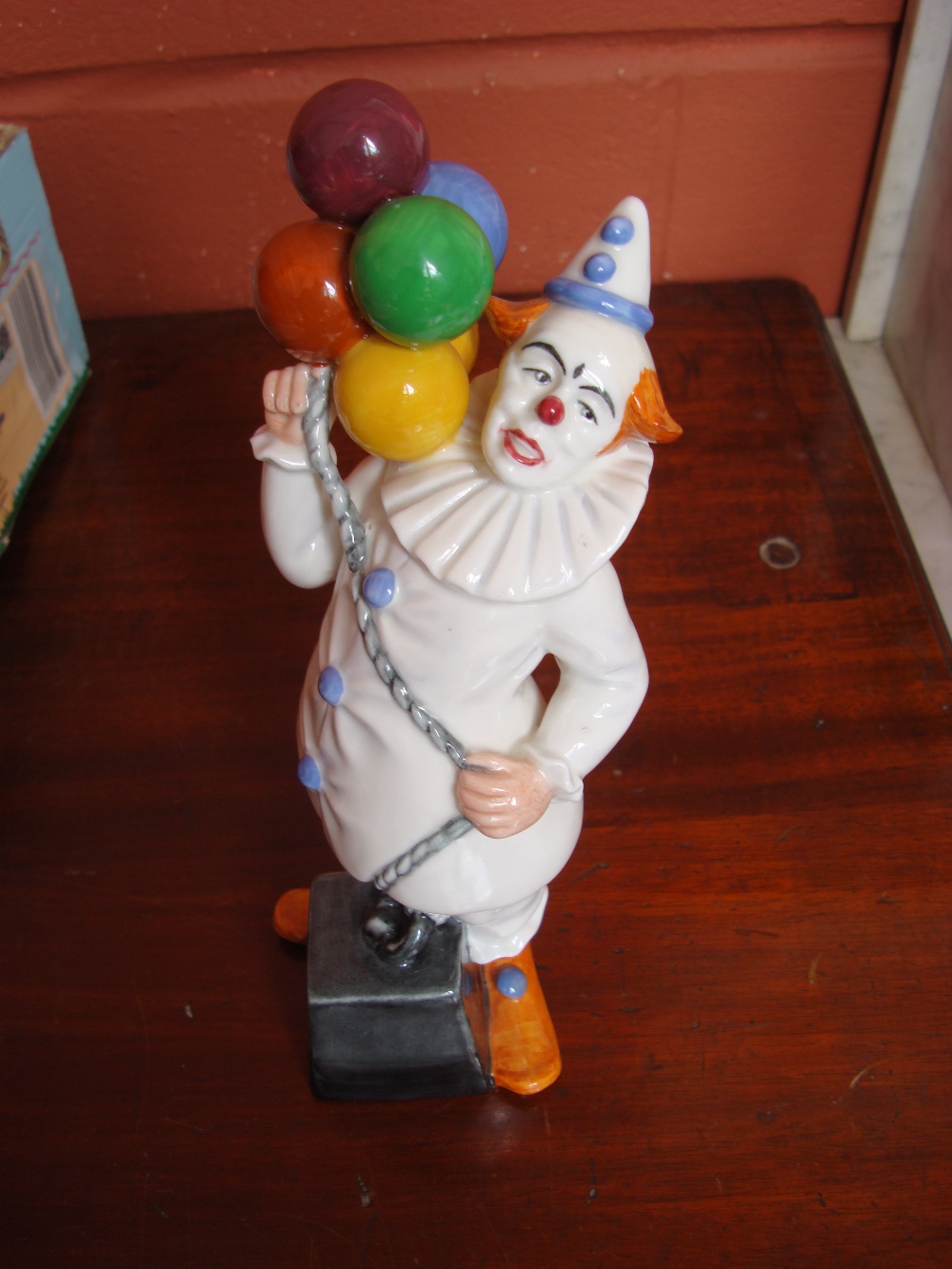 A Royal Doulton ''Balloon Clown'', No HN2894, dated 1985, designed by William K.Harper.