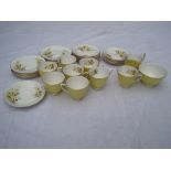 A Royal Albert primrose decorated part coffee service comprising twelve side plates, twelve saucers,