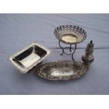 A silver sweet dish on three legs, Chester, 1906 by James Deakin & Sons together with a silver sugar