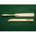 An ivory page turner together with an ivory letter opener.