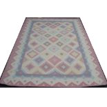 An Indian dhurrie rug, multicoloured geometric shapes on a cream background. 256 x 174 cm.