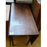 A George III mahogany drop leaf table.