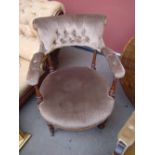 An Edwardian tub chair.