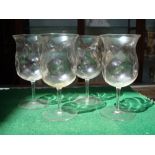 Four Arts and Crafts drinking glasses, probably James Powell, Whitefriars, cylindrical wrythen and