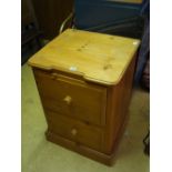 A pine two drawer unit, 79cm high.