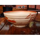 A Clarice Cliff bowl, with orange weeping willow design, blue backstamp and numbered 633, approx