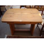 An Art Deco drawleaf dining table.