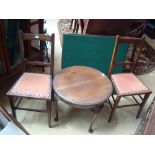 An occasional table, two chairs and a fold out card table.
