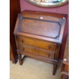 A mahogany bureau.