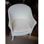 A Lloyd Loom white painted wicker commode chair.