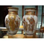 A pair of Oriental style crackle glazed vases.