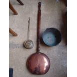 A brass jam pan, a brass 18th Century chestnut roaster and a 19th Century brass warming pan (3).