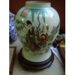 A mid 20th Century Chinese polychrome vase.