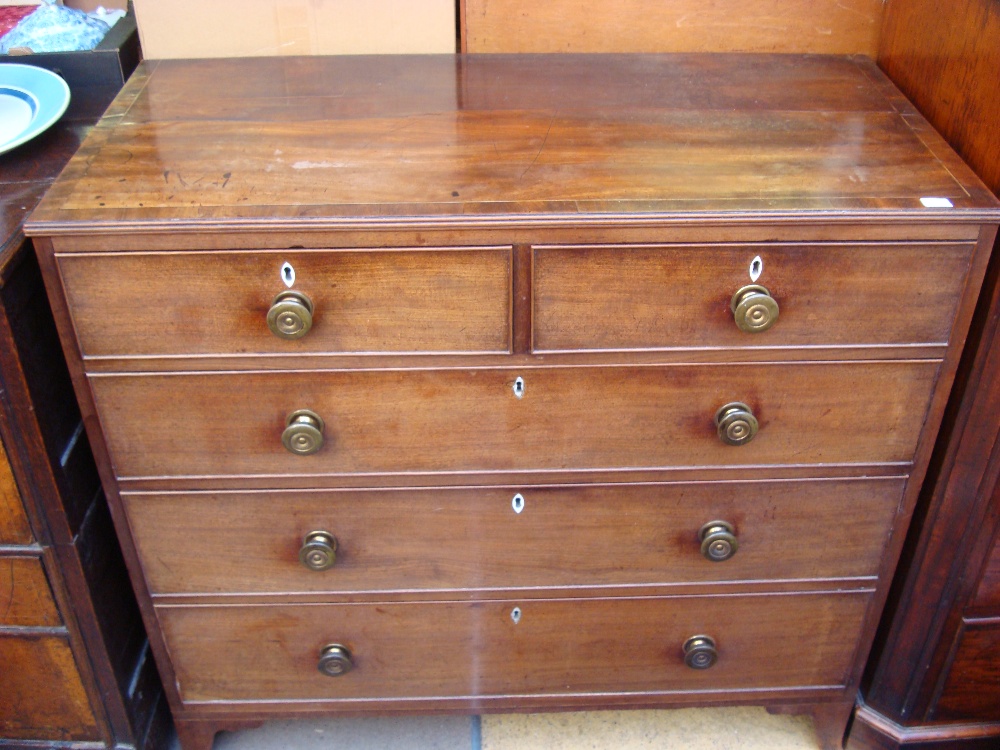 A George III mahogany chest of drawers.