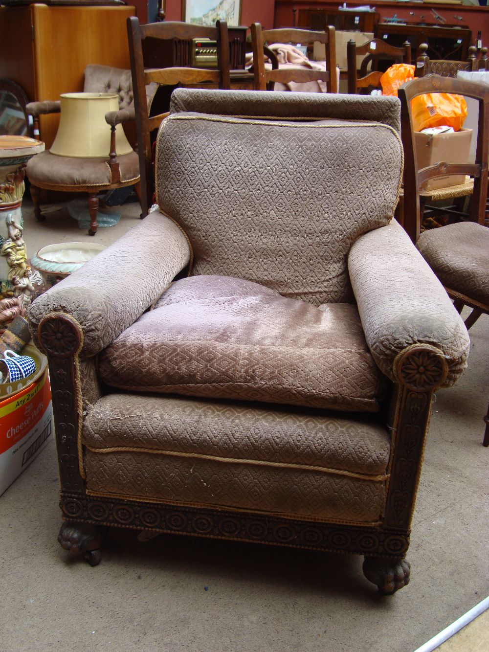 A ball and claw Edwardian arm chair.