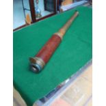 A 19th Century three draw day or night nautical telescope in brass and mahogany, inscribed