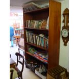 A teak open bookcase.