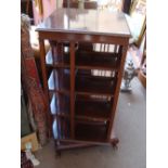 A large mahogany revolving bookcase, 105cm high.