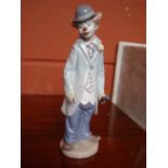 A Lladro porcelain ''Circus Sam with violin'', dated 1987, No 5472 by Francisco Catala.