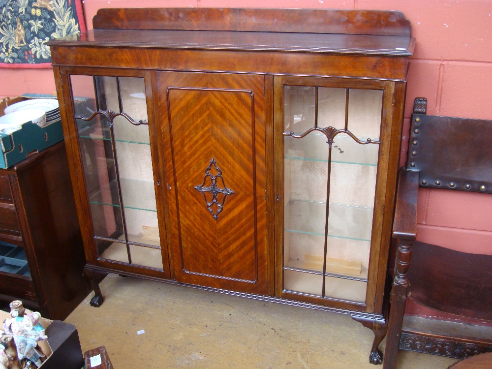 A mahogany glazed display cabinet.