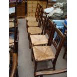 A pair of Lancashire ladderback chairs with rush seats, another similar and two others (5)