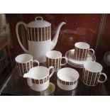 A Susie Cooper Wedgewood 'Saturn' coffee set, comprising of a coffee pot with lid, four coffee cups,