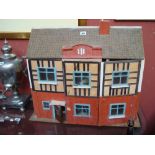 A Ca. 1950's dolls house and furniture.